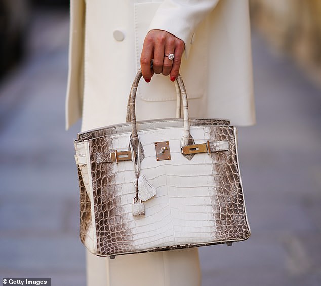 The handbag costs a whopping $432,000, but Nicole's client wanted it to have diamond hardware, which she said brought the price tag to $750,000.