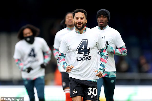 Luton players wore shirts with their captain's name during their pre-match warm-ups