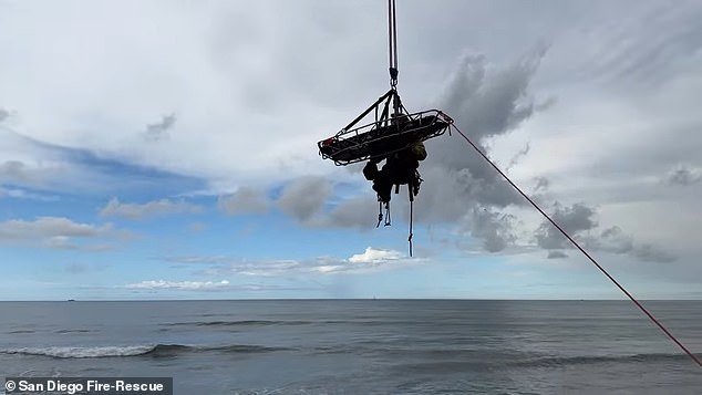 The unidentified middle-aged man became trapped from the waist down in the 12- to 18-inch hole after falling under broken concrete sections on the side of the Ocean Beach cliff.