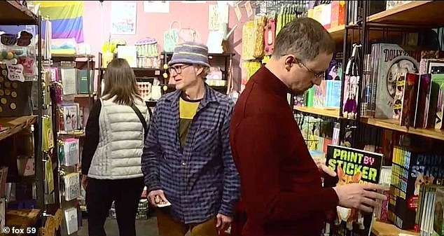 Shoppers are seen at stores in Indianapolis, Indiana, preparing to make last-minute purchases for Christmas Day.  Officials say they expect Saturday to be the second busiest shopping day of the year, behind Black Friday