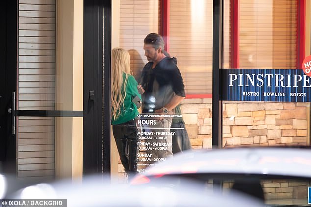 The couple was seen spending a moment together outside the Pinstripe restaurant before heading outside to find their car