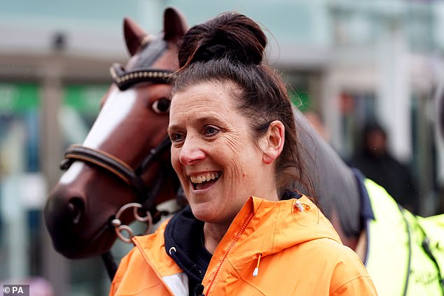 Ms Webb smiled happily as she arrived in London today as more than 2,200 people donated to her fundraising campaign for suicide prevention charities