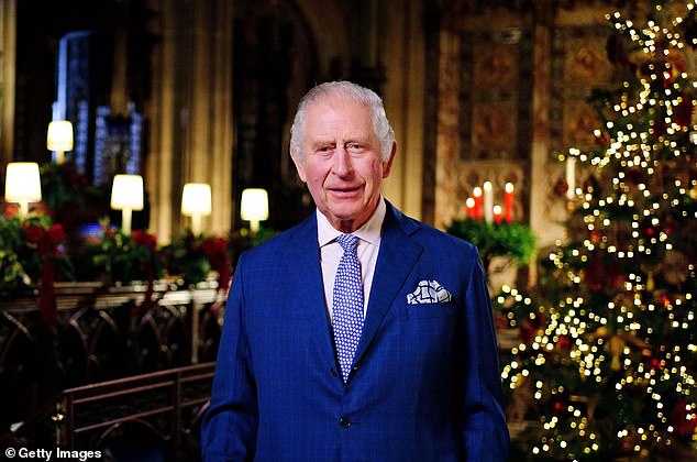 It appears the King is also recycling his suit as he is pictured in the same blue single-breasted design he wore to last year's Christmas message (pictured)