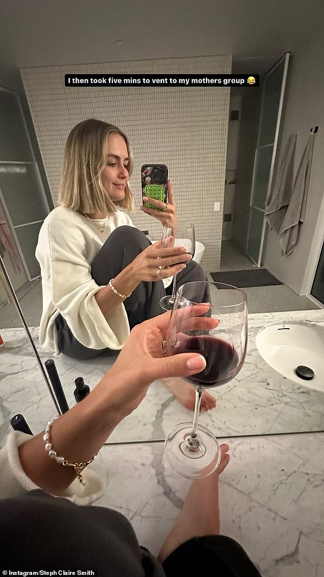 Steph also shared a photo of herself relaxing alone in a bathroom with a glass of wine, alongside the caption: 'I then took five minutes to vent to my mum's group'