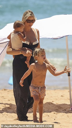 Indy, who was recently named TikTok Creator of the Year, looked radiant in a black and white one-piece swimsuit