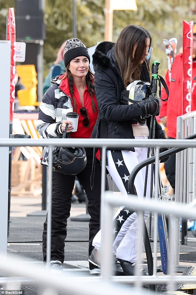 She was seen right behind her daughters as they headed to a ski lift