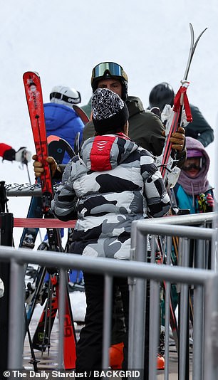 He was seen at one point waiting for Richards and holding their skis