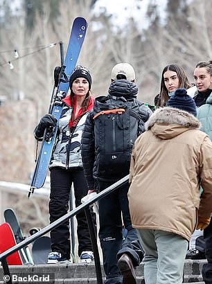 At one point, Richards was spotted descending the stairs next to her daughters as they wore their helmets and skis