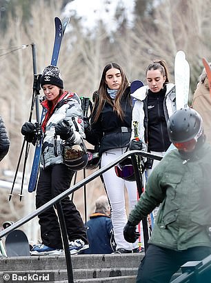 She seemed in good spirits as she returned from her tropical vacation in Mexico to celebrate the holidays with her family in snowy Aspen.