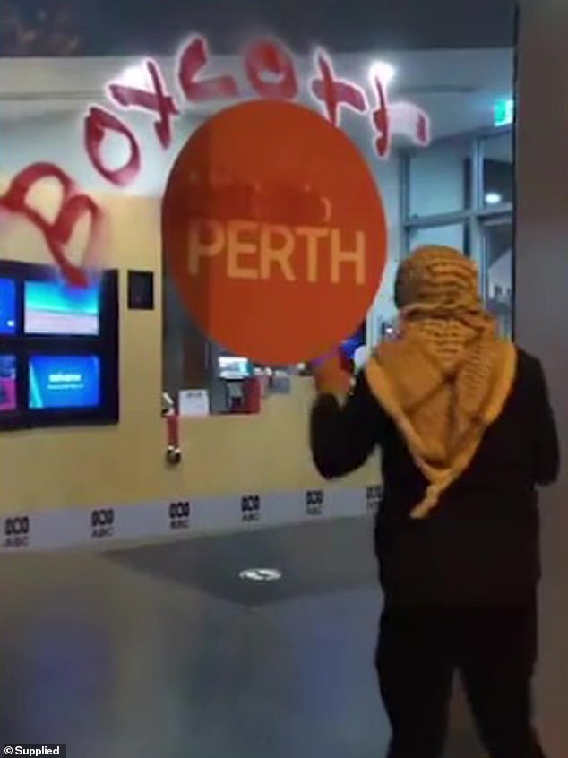 A pro-Palestinian protester filmed himself vandalizing the ABC offices in Perth (above) and wrote 'boycott - justice for Antoinette'