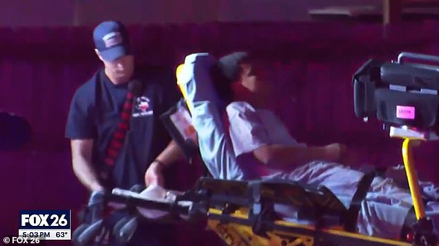 Daniel Alexander Rodriguez-Olivares is seen here being loaded into an ambulance after the incident on Thursday