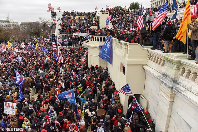Supporters of US President Donald Trump storm the US Capitol in Washington DC on January 6, 2021
