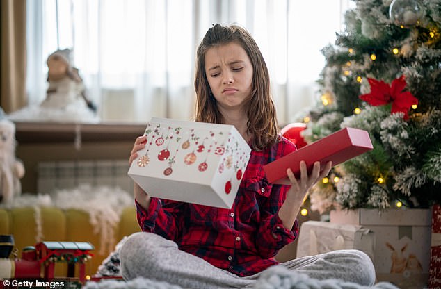 Body language expert Adrienne Carter has shared how to tell if a recipient is lying, as well as how to hide your disappointment if you want to spare someone's feelings (stock image)