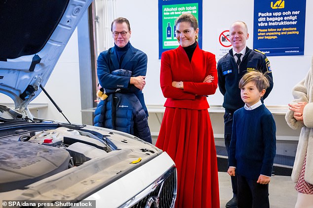 Victoria was accompanied by her husband Prince Daniel, 55 (pictured left) and children