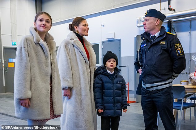 Princess Estelle (left), who seemed happy to attend the royal engagement, followed her mother's example by wearing a faux fur coat