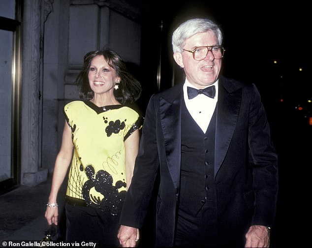 Another photo of Thomas and Donahue shows them together in 1985 - at the height of Donahue's chat show fame