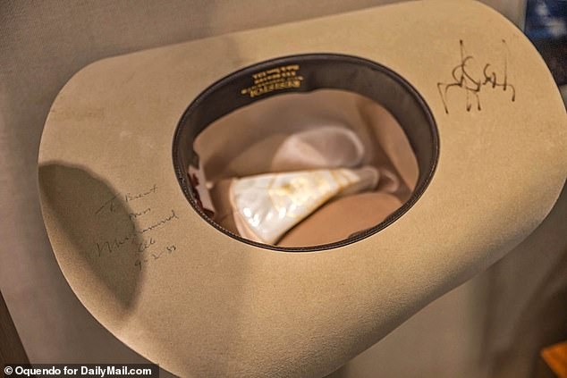 Below the Museum of Found Treasures is this cowboy hat signed by Muhammad Ali (photo above).