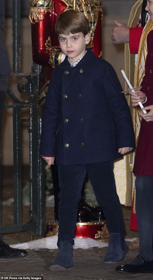 Prince Louis was dressed in a checked shirt with a smart navy blue jacket and Chelsea boots