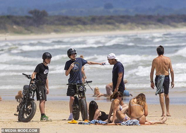 Both families were spotted enjoying the sun