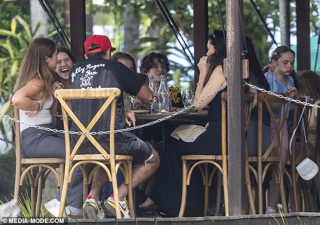 The children laughed and played in the famous Byron Bay restaurant when their meal arrived