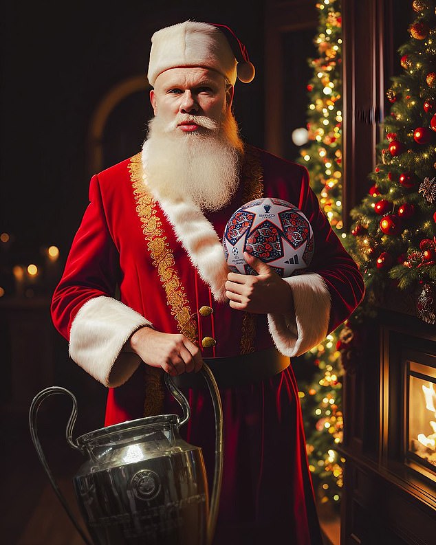 Man City striker Erling Haaland posed in Christmas kit while holding the Champions League trophy and the ball