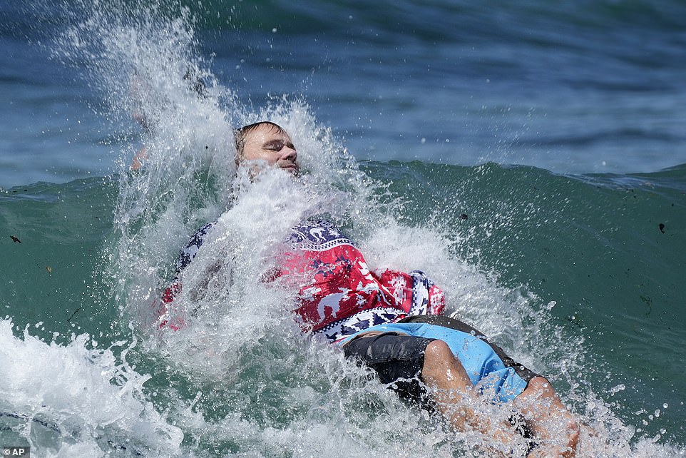 One man wore his Christmas jumper as he took a dip in the ocean at Bondi