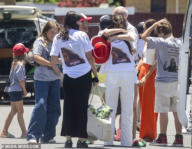 The group was seen hugging relatives farewell after attending a luncheon