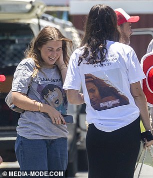 Packer's family wore t-shirts with a printed photo of Erica's 2006 hit single I Spy, while Bennet's wore a photo of an image of South Park character Randy Marsh