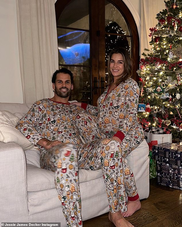 The 35-year-old country singer was joined by her husband, Eric Decker, and their three children as they posed for the shots, all wearing matching pajamas.