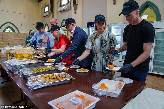 Anthony Albanese and his girlfriend Jodie Haydon (pictured) spent their Christmas Day serving lunch to vulnerable Australians