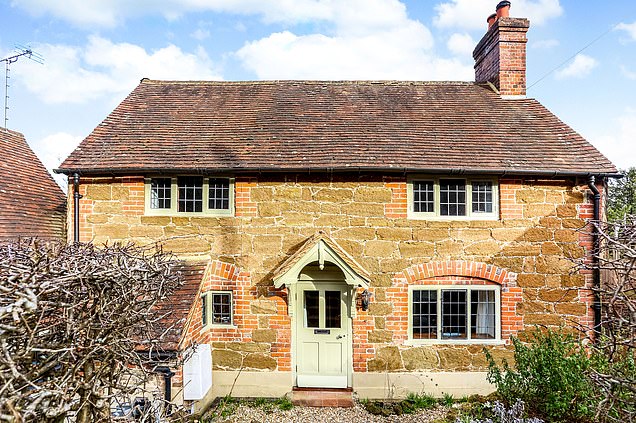 The house that inspired the home in The Holiday, Honeysuckle Cottage, is located in the village of Holmbury St Mary