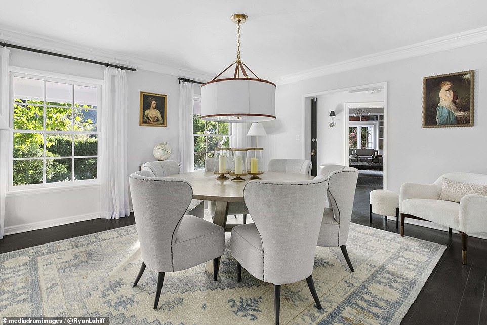 The dining area offers views of the greenery outside