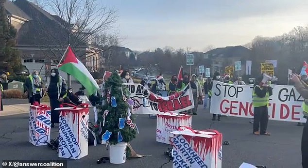 Protesters spoke from blood-soaked podiums decorated with the names of weapons and defense companies, including Northrop Grumman and Lockheed Martin