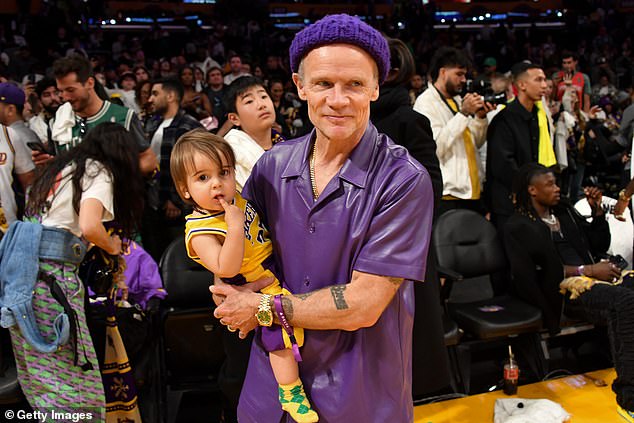 Darius who wore a Lakers jersey along with purple pants.