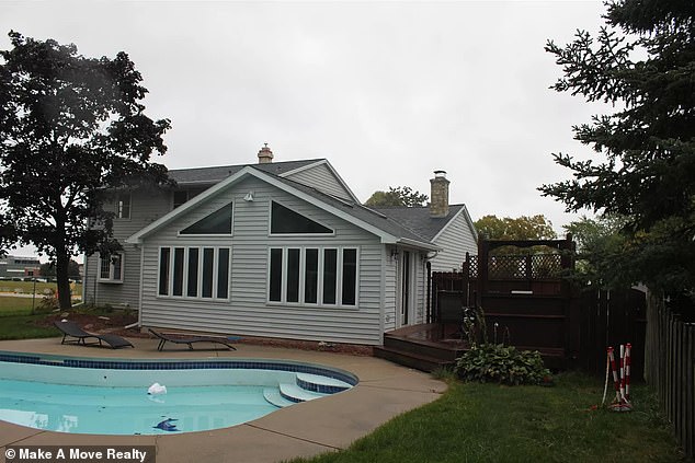 The house, built in 1968, features a small backyard and a swimming pool