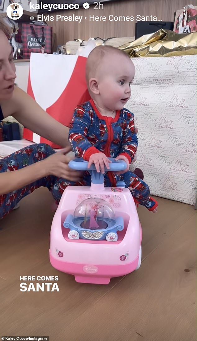 She also shared a short video – set to Elvis Presley's Here Comes Santa Claus – of Matilda being pushed towards the camera in a car as the child reacts happily.