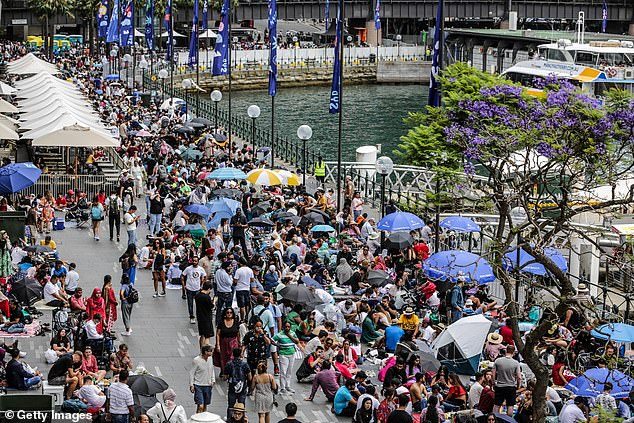 Free spots are some of the best places to view the Harbor Bridge, including Barangaroo Reserve, Bradfield Park and Mary Booth Reserve (pictured, revelers at Circular Quay ahead of the 2022 fireworks)