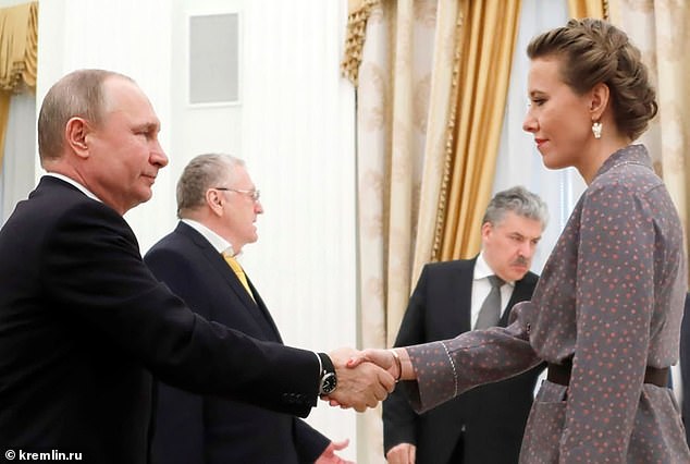 President Vladimir Putin meets Ksenia Sobchak at the Kremlin in 2020. She is known as Putin's goddaughter after he attended her baptism