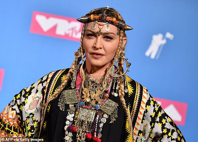 The producer praised the Grammy Award-winning singer, saying the pair have become extremely close over the years;  Madonna can be seen in 2018