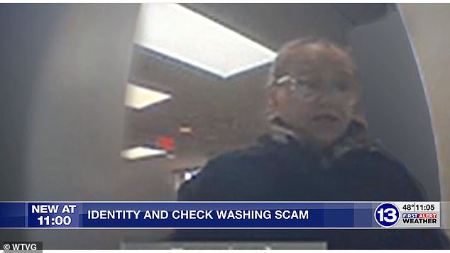 The suspect, pictured, bears a resemblance to a scammer who Oregon police say targeted at least five banks using a fake passport and stolen Social Security numbers.