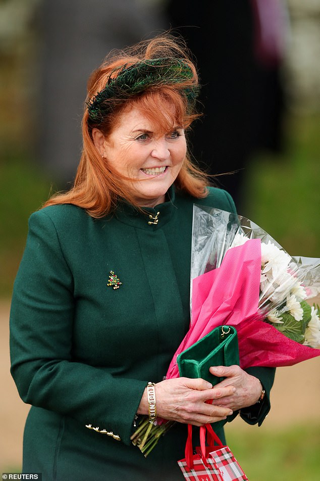 Fergie held a bouquet of flowers as she wore a dark brown dress, teamed with a festive Christmas tree brooch and a large bracelet with her daughter's name 'Eugenie' on it.