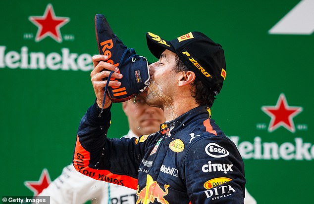 The shoey has become an Australian cultural tradition thanks to big names from the grassroots, such as F1 superstar Daniel Ricciardo (pictured)