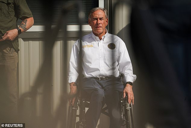 Texas Governor Greg Abbot attends the event for Republican presidential candidate and former US President Donald Trump during his visit to the southern border in Edinburg, Texas, US on November 19