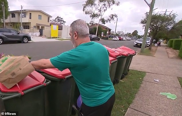 Resident Ray Losh (pictured above) cannot open his balcony door or windows because of the flies the uncollected trash has attracted