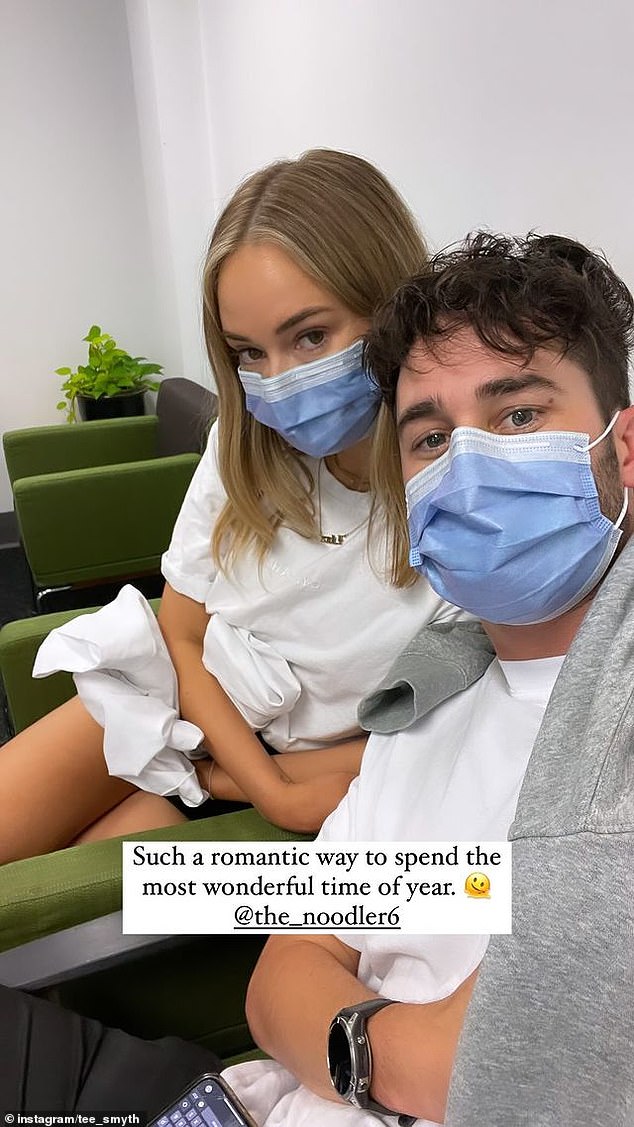 In the next story, she shared a photo of herself and boyfriend Ned (pictured right) as they waited to hear from the doctors, with the sarcastic caption 