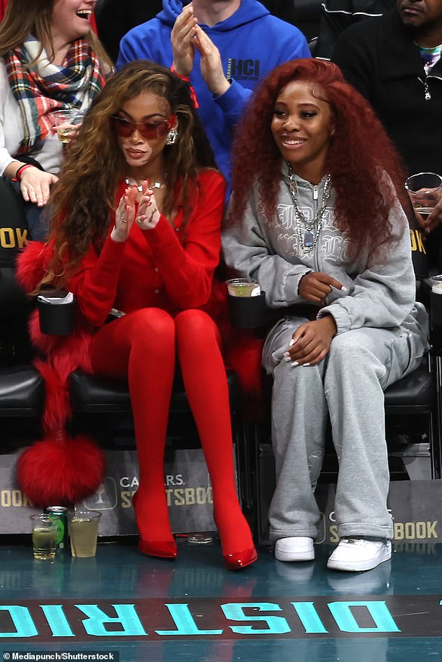 The former America's Next Top Model contestant enjoyed the game from enviable courtside seats as she watched the match with a glamorous friend