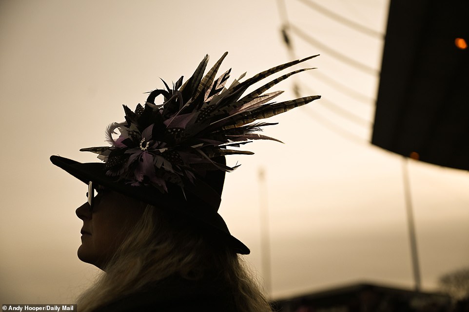 Festive racegoers dressed up for the spectacle in their best winter attire - and perhaps showed off some Christmas presents