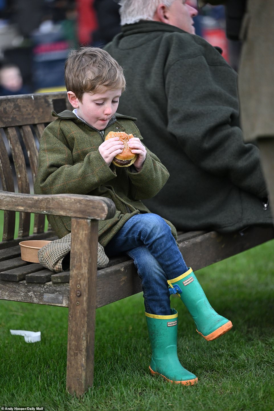 A young fan took advantage of the many food stalls to take a break and have lunch during a day out in Sunbury-on-Thames