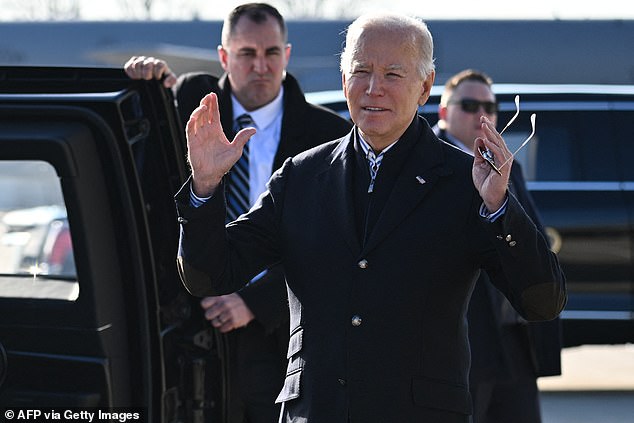 President Joe Biden responds to questions from members of the media upon arrival at Milwaukee Mitchell International Airport in Milwaukee, Wisconsin, on December 20, 2023