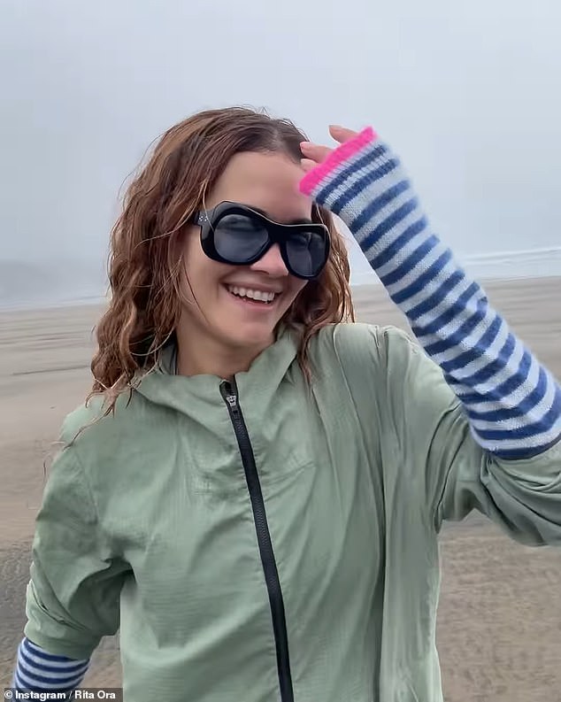 She joked in the caption that in a clip of her dancing and singing on the wet sand dunes, she had tried to recreate the iconic video for Coldplay's 2000 hit Yellow.